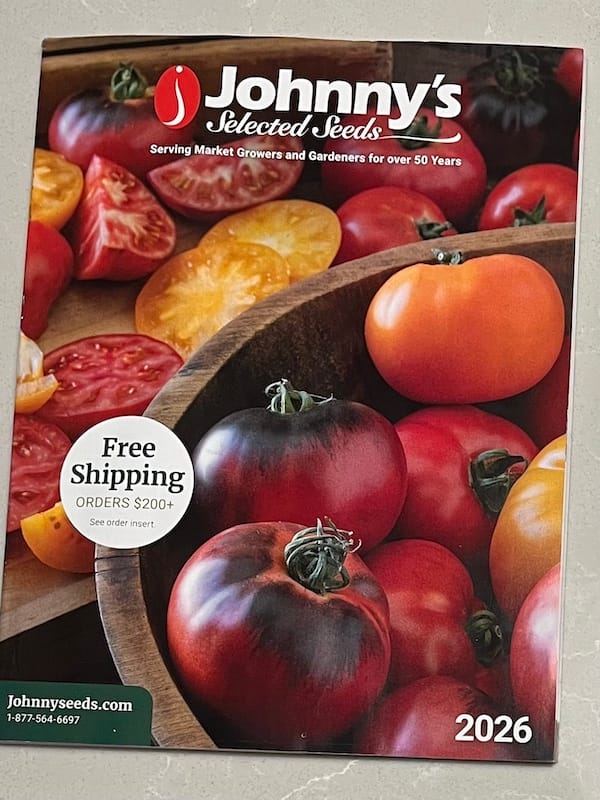 Johnnys Selected Seed Catalog showing big ripe tomatoes