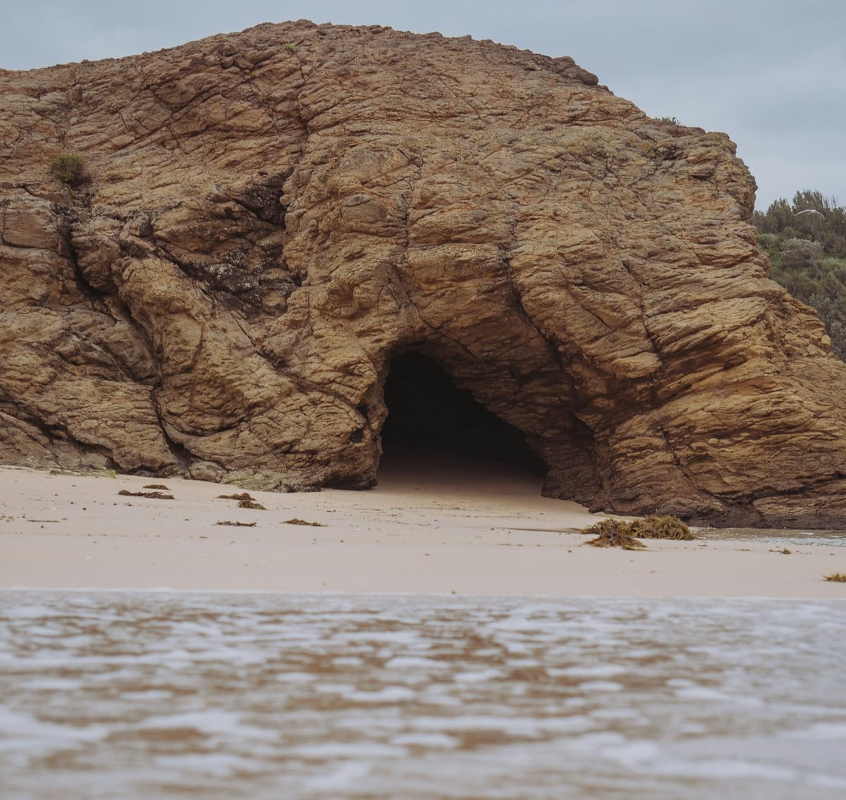 entrance to a cave viewed from the water
